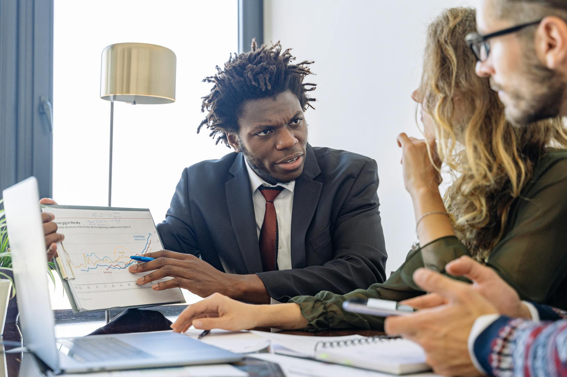 Business Professionals Discussing Financial Data D