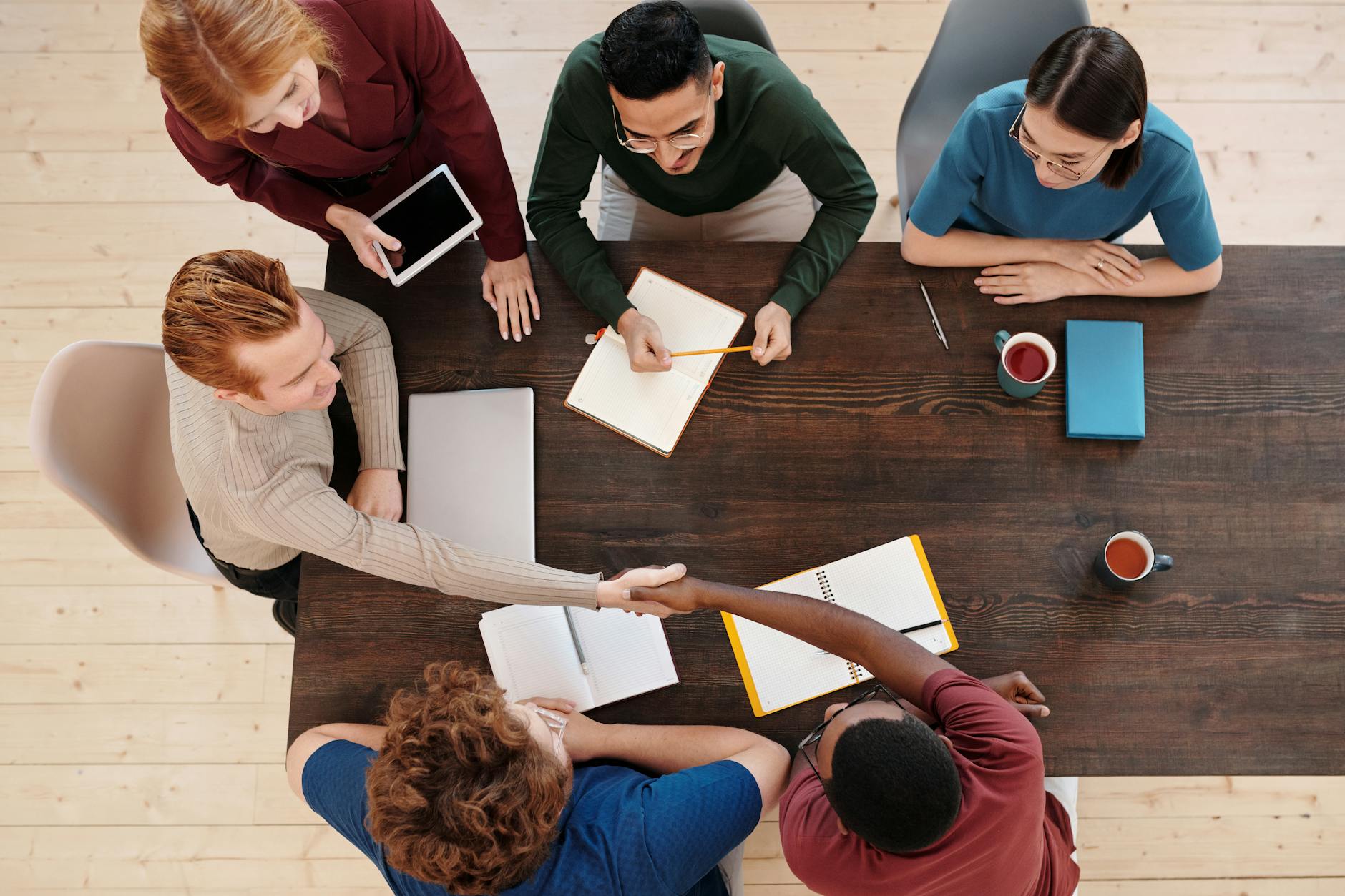 Top View Of A Diverse Business Team Meeting With A