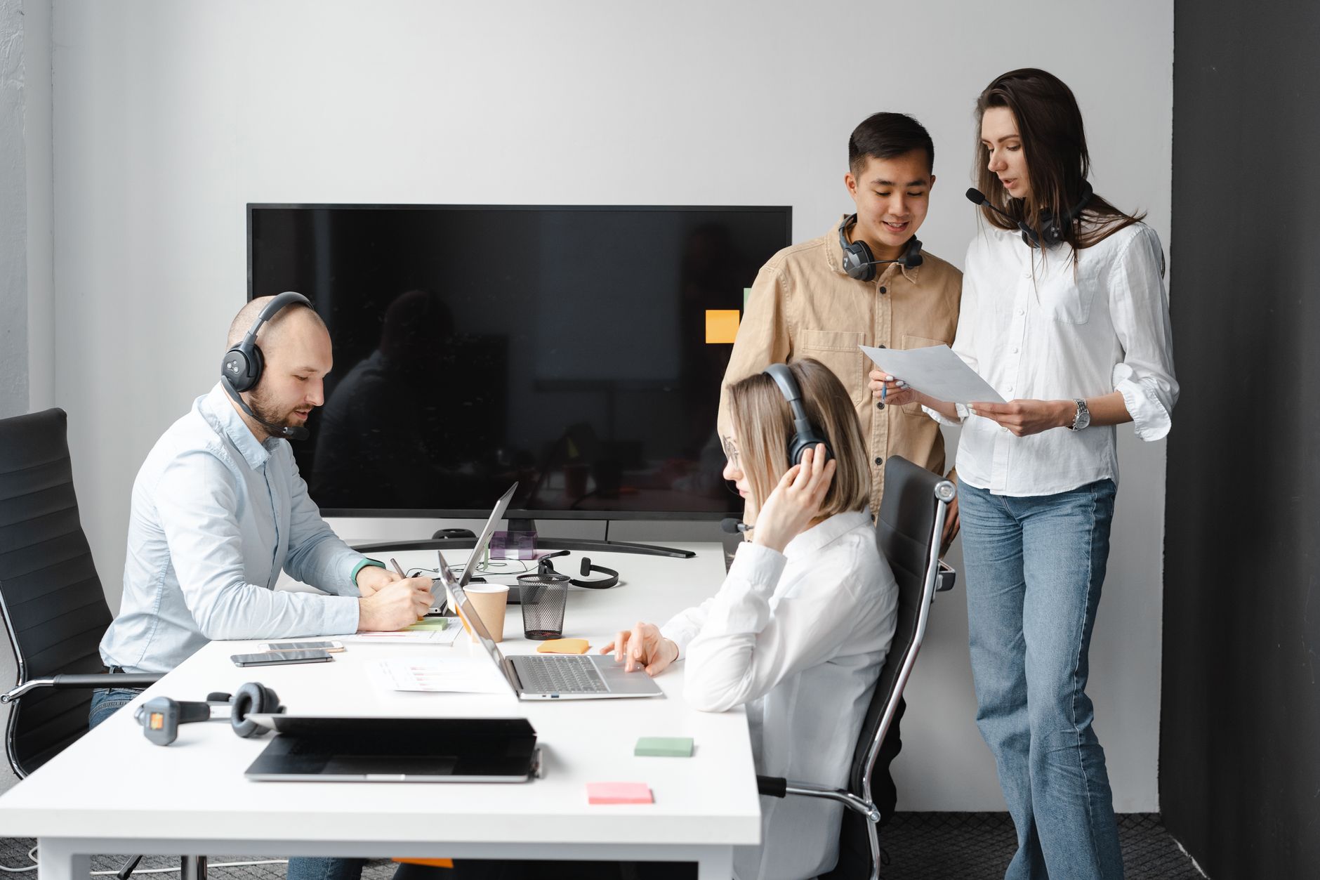 A Diverse Group Of Coworkers Collaborating In A Mo