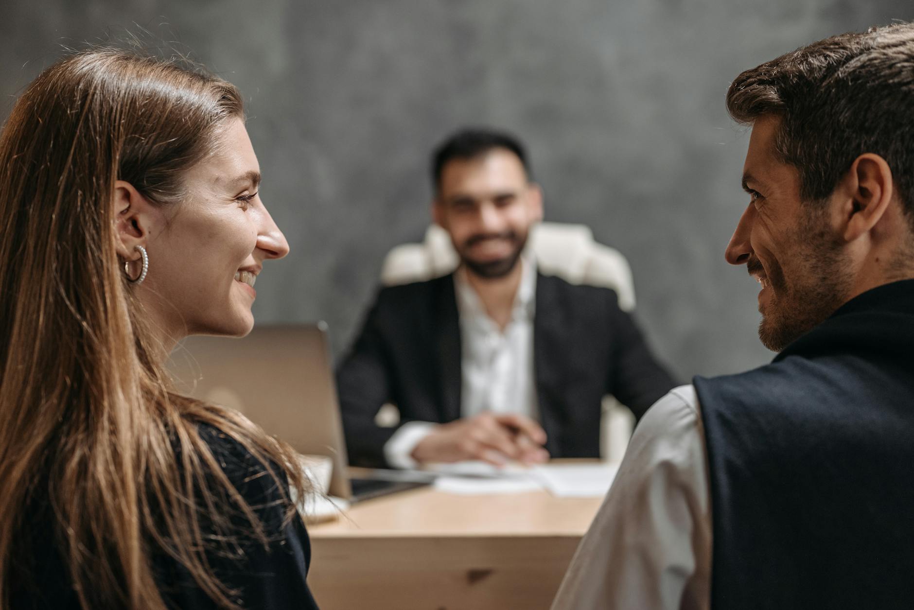 A Friendly Business Meeting With Smiling Professio