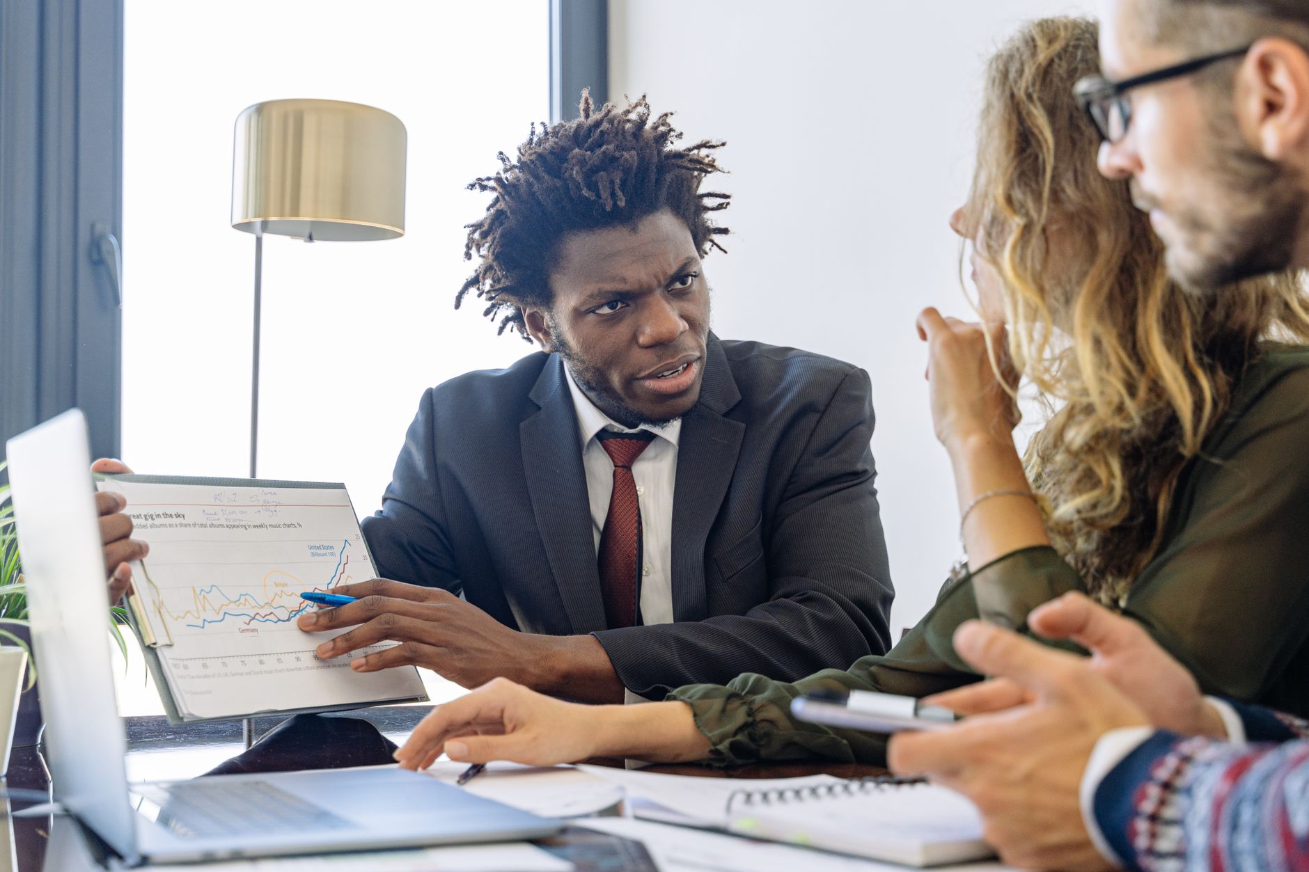 Business Professionals Discussing Financial Data D
