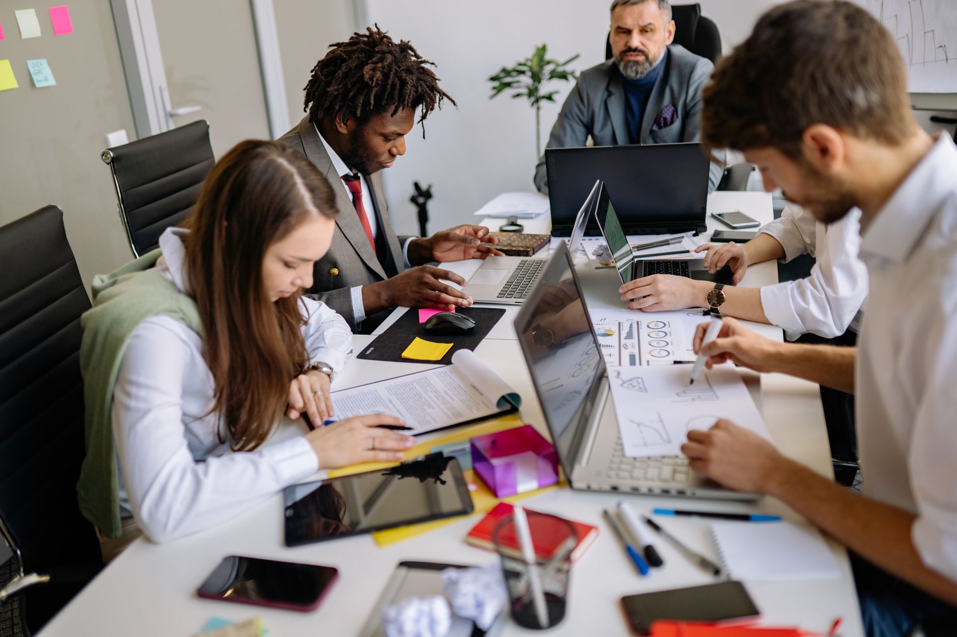 Team Of Professionals Collaborating Around A Table