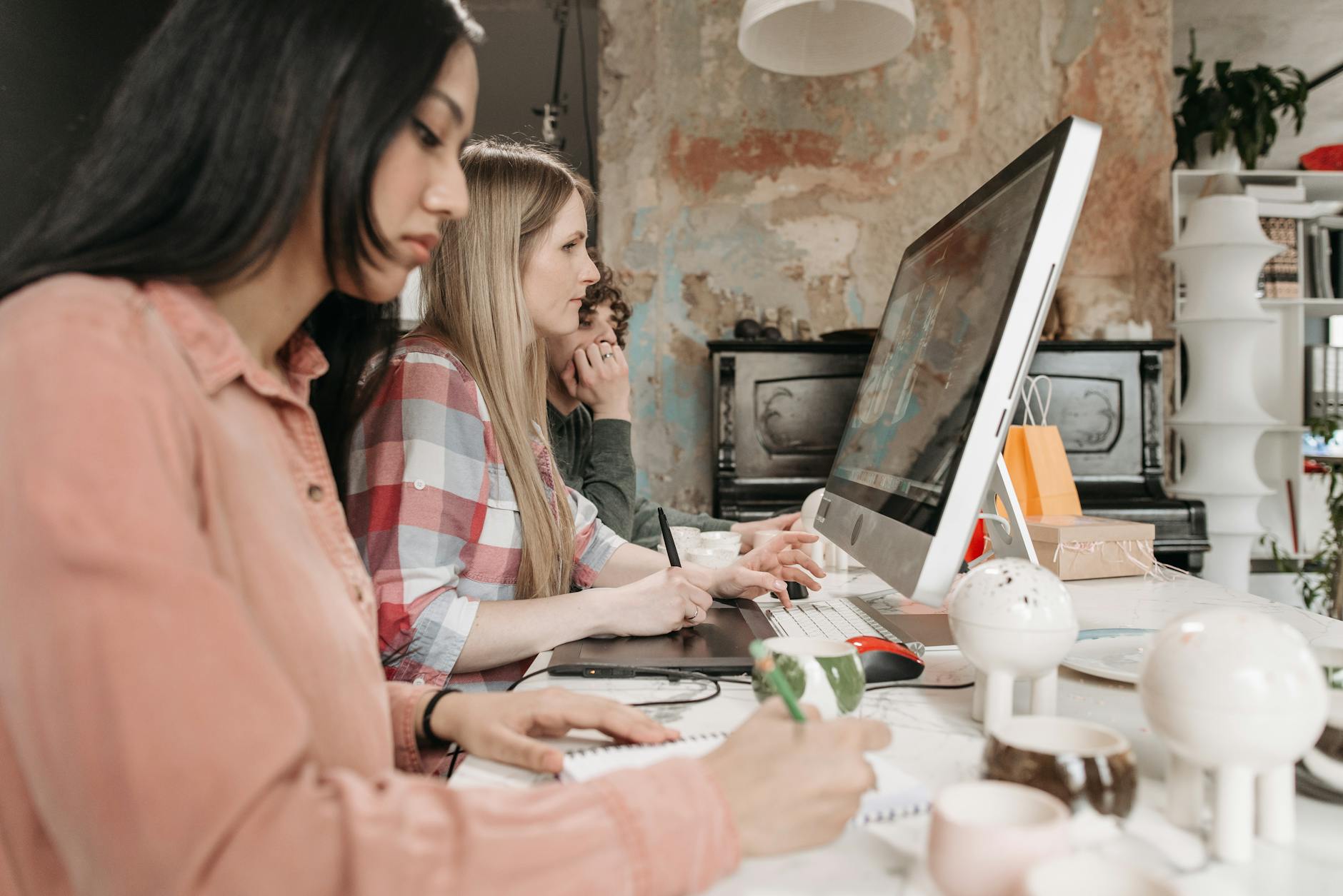 Financial Consulting For Small Business: Expert Guidance 4 Three Young Professionals Collaborate With Technol 1