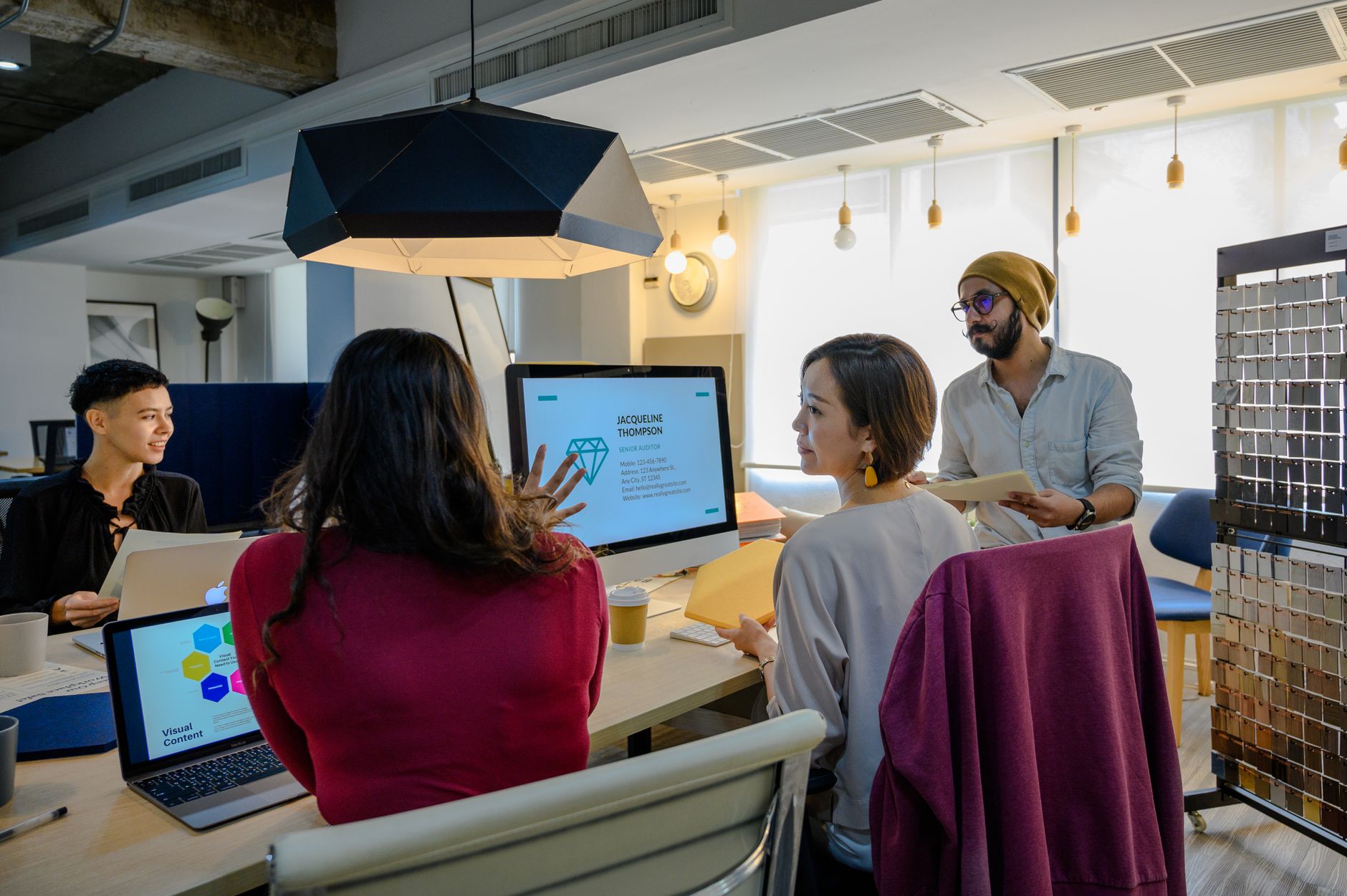 A Diverse Group Of Professionals Working Together