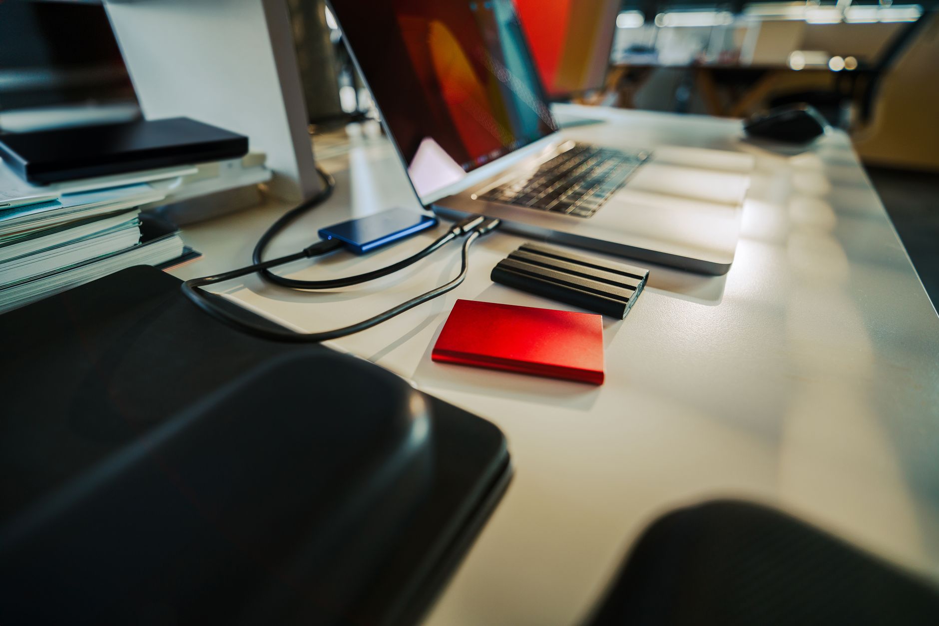 A Neatly Organized Office Desk Featuring A Laptop