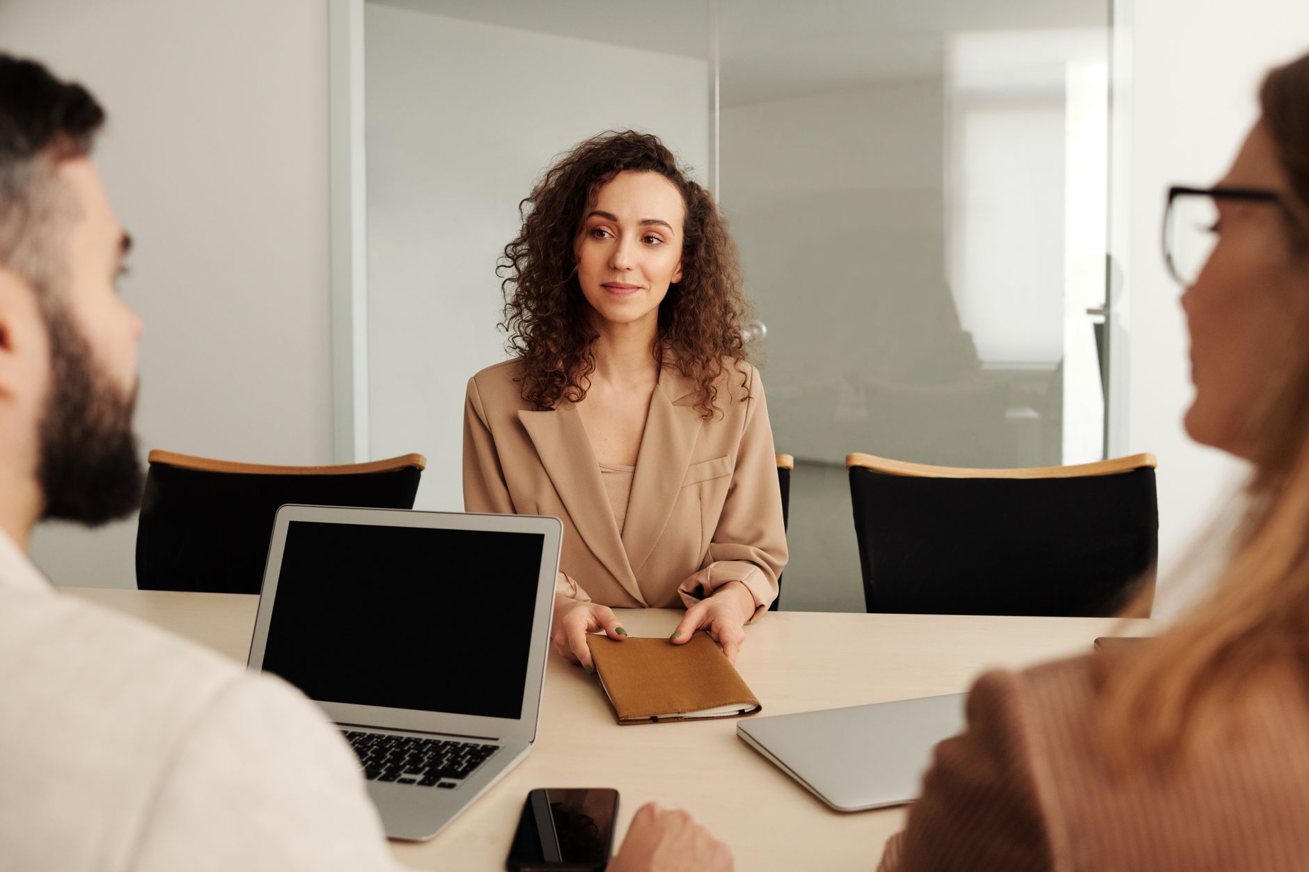 A Woman In A Business Suit Participates In A Job I 2