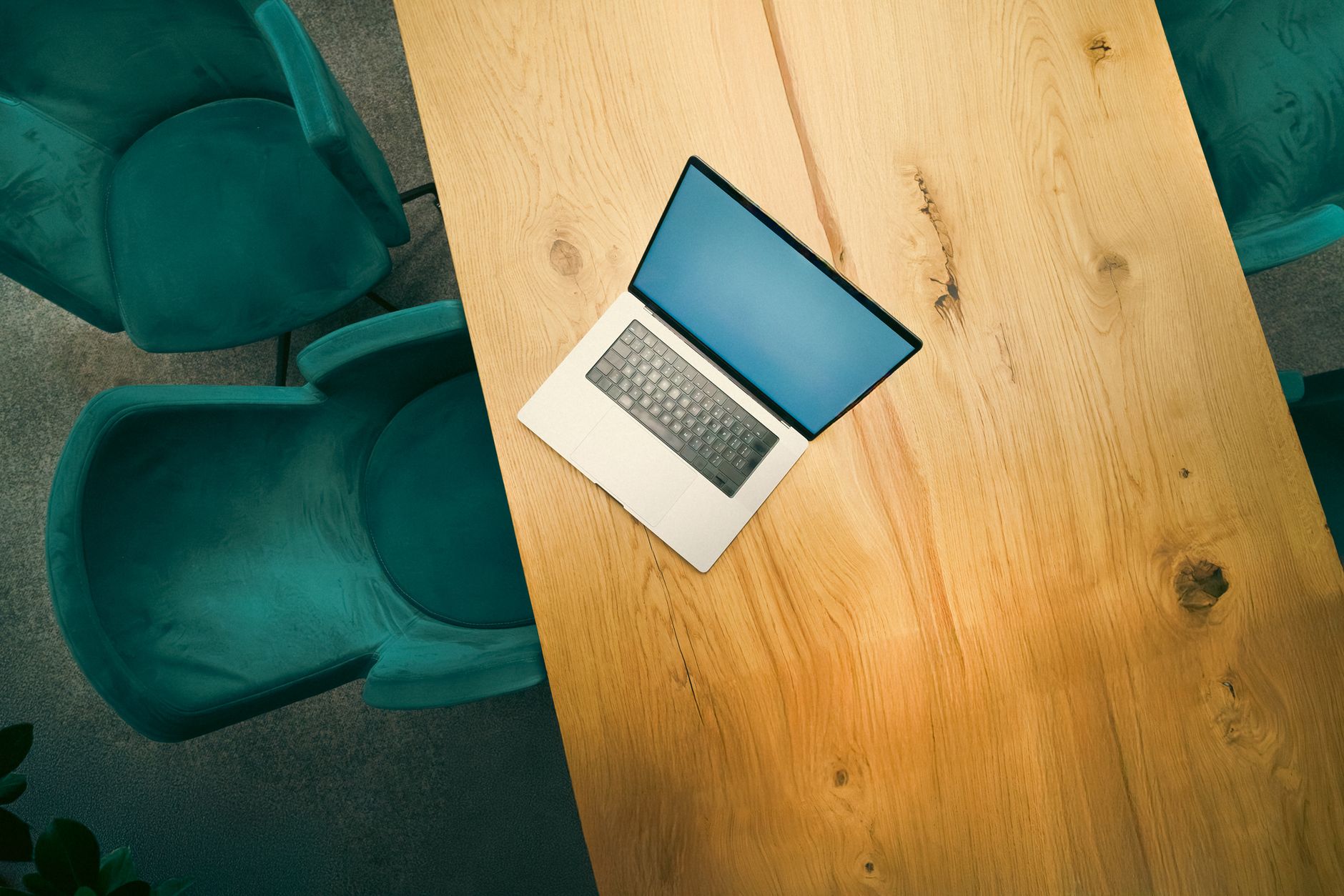 Aerial View Of A Laptop On A Wooden Table Surround