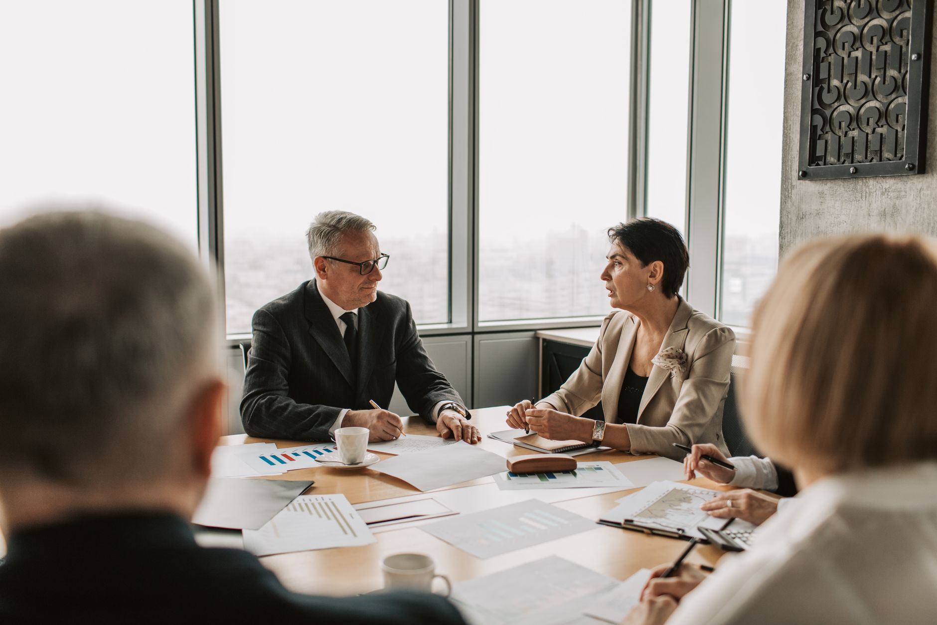 Business Professionals Engaged In A Strategic Meet