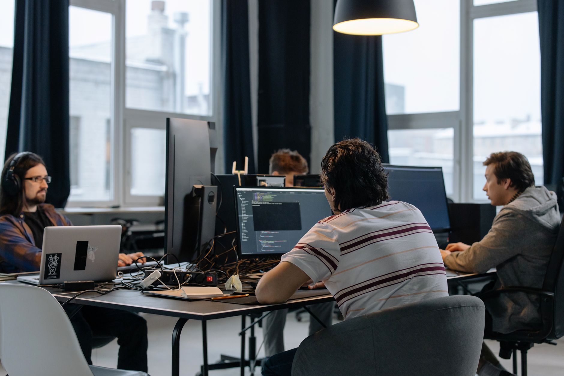 Team Of Developers Working Together On Computers I 6